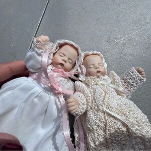 Set of Two Antique Porcelain Baby Dolls with Antique carriage
